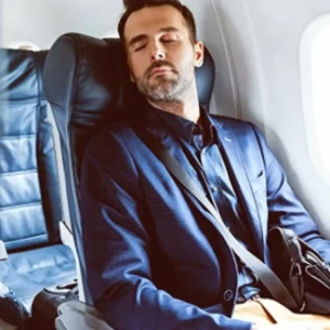 a jet lag man on a flight
