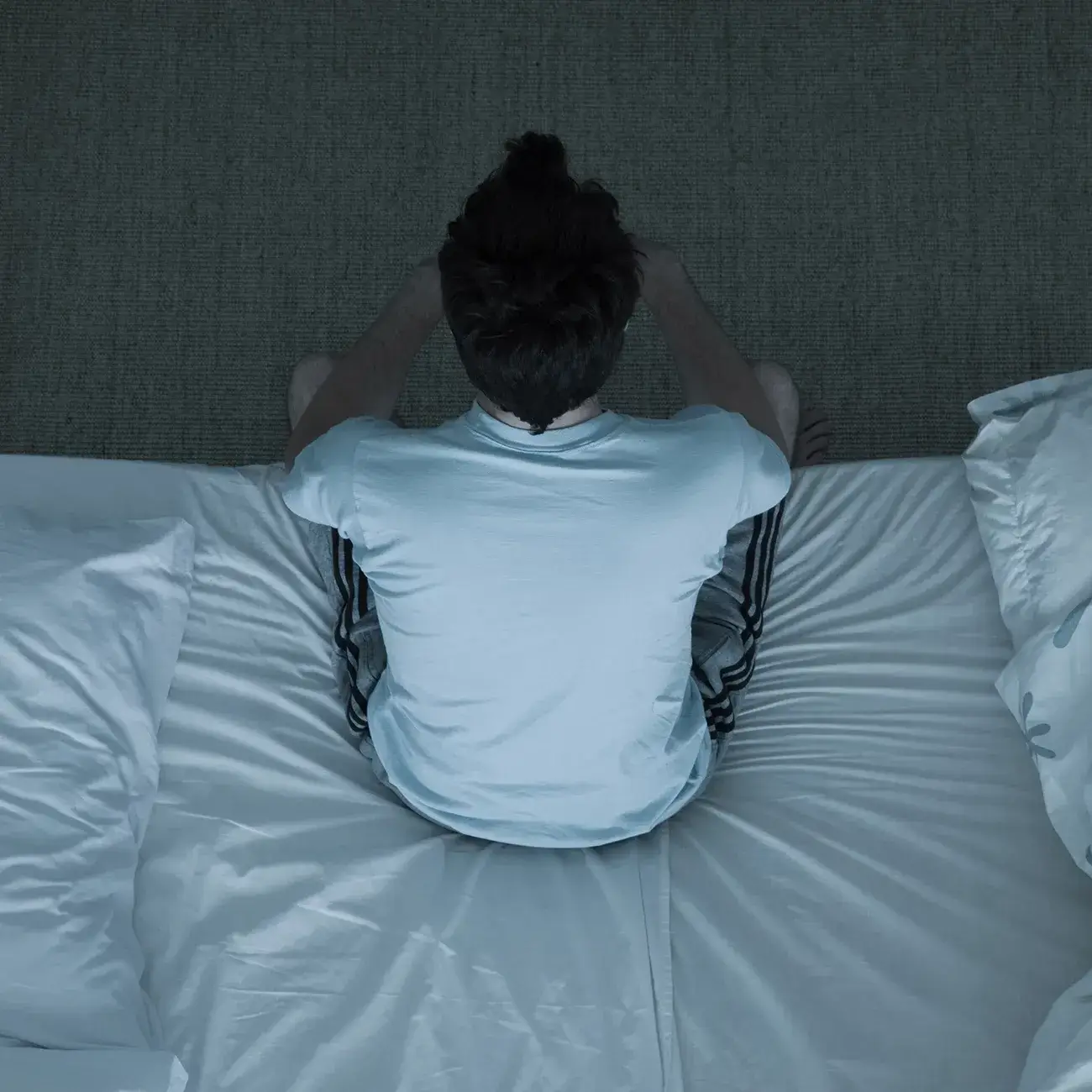 Man who has woken up in the middle of the night