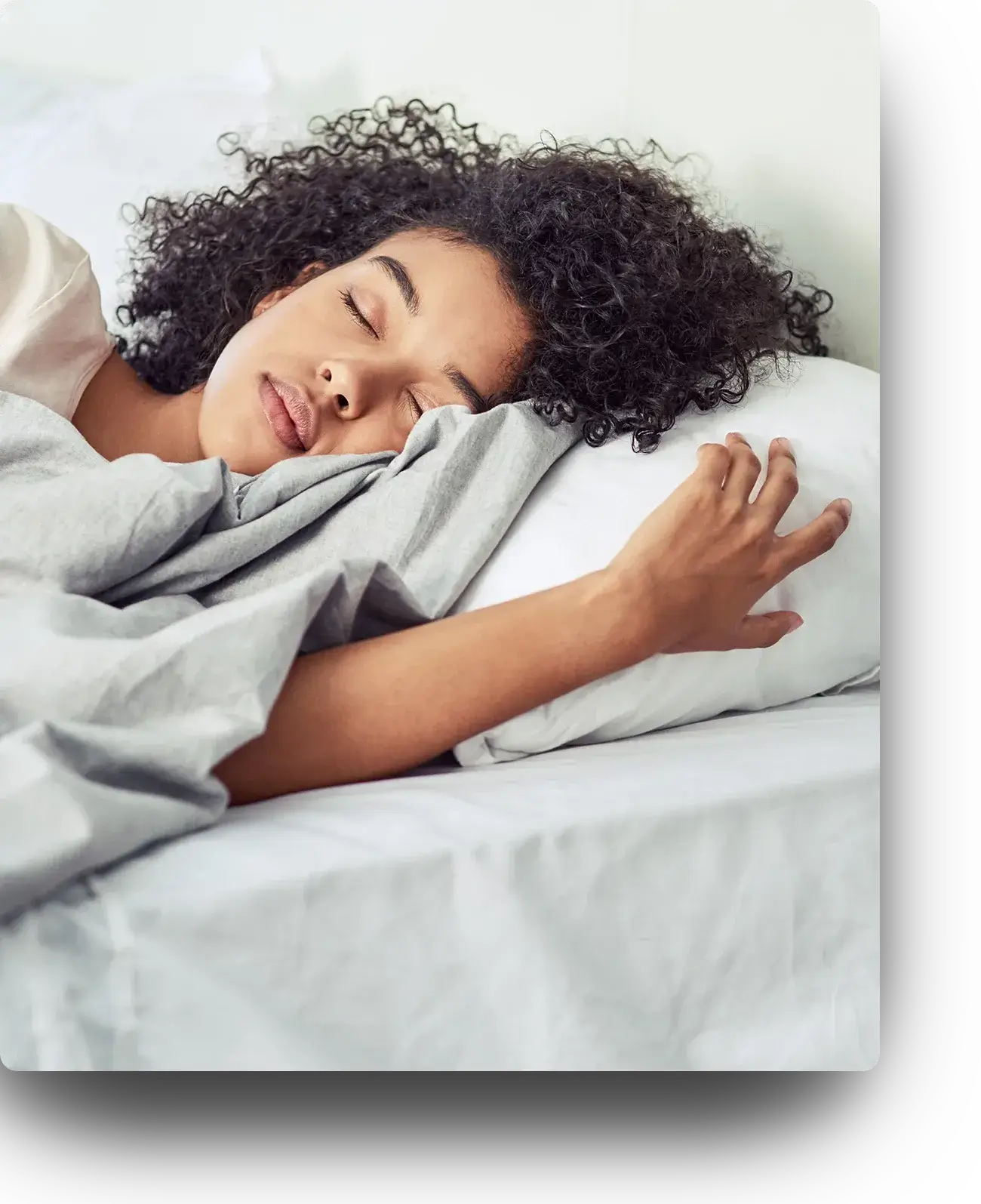 Woman on her side in a deep sleep